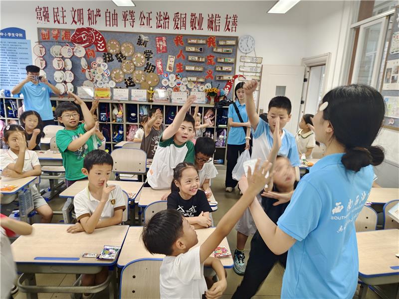 在孩子心中种下文化传承的种子，西南石油大学学生赴新都区教科院附小开展社会实践